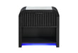 Black Beckett nightstand with a fluted drawer, open shelf and blue lighting