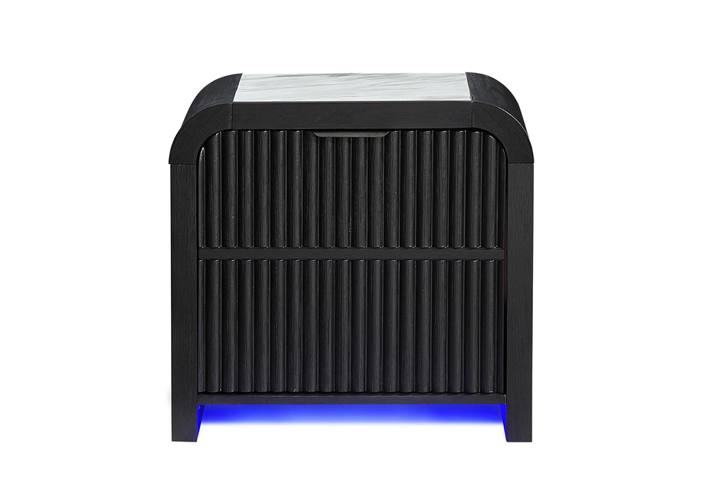 Black Beckett nightstand shown with closed fluted lower panels and blue lighting