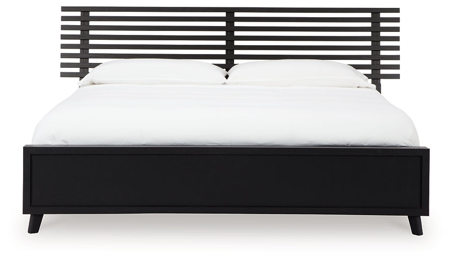 Danziar King Panel Bed with Mirrored Dresser, Chest and Nightstand - Raleigh Outlet