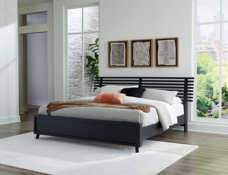 Danziar King Panel Bed with Mirrored Dresser, Chest and Nightstand - Raleigh Outlet