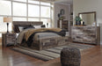 Derekson King Panel Bed with 4 Storage Drawers with Mirrored Dresser, Chest and Nightstand - alternate view 2