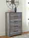 Bronyan King Panel Bed with Mirrored Dresser, Chest and Nightstand - alternate view 17