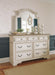 Realyn California King Upholstered Panel Bed with Mirrored Dresser - alternate view 5