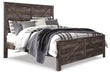 Wynnlow King Crossbuck Panel Bed with Mirrored Dresser, Chest and Nightstand - alternate view 7