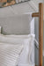 Lyncott King Upholstered Bed with Mirrored Dresser and Nightstand - alternate view 14