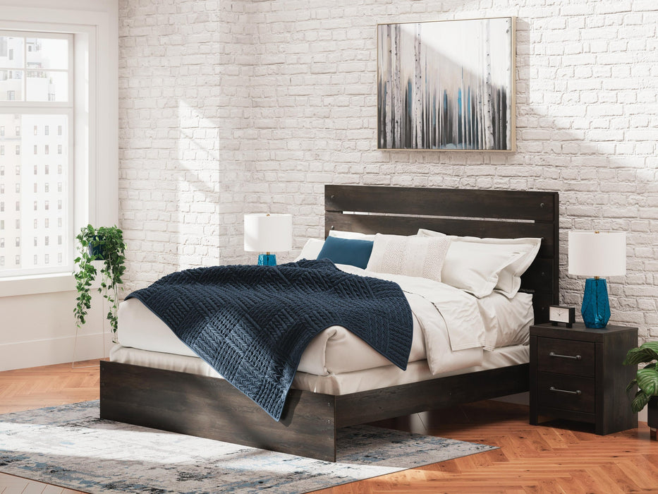 Delmorta King Panel Bed, Dresser, Mirror, Chest and Nightstand - alternate view 28